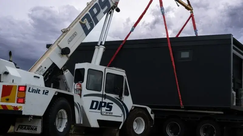 Franna crane hire highlands moving shipping container.